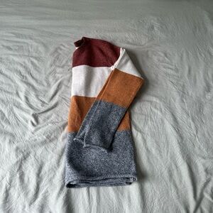 Pinque striped sweater in size small. NWT.